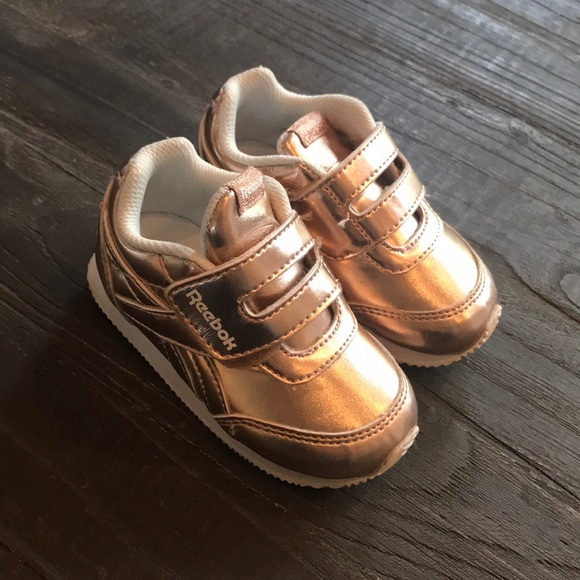 gold reebok sneakers